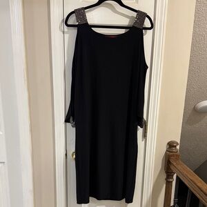 Jennifer Lopez Elegant Black Evening Dress with Embellished Shoulders